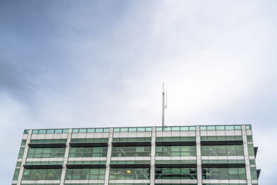 Low angle view of modern building against sky