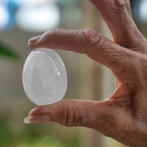 Close-up of hands holding glass