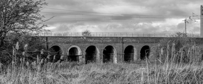 Low angle view of bridge against sky