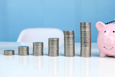 Stack of objects against blue background