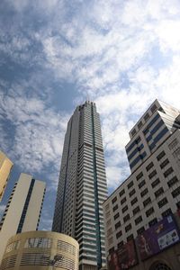 Low angle view of modern buildings against sky