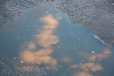 High angle view of wet glass window during rainy season