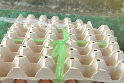 High angle view of plastic pattern in row