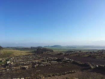 High angle view of land against clear sky