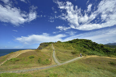 View of landscape against cloudy sky