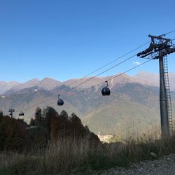 Scenic view of mountains against clear blue sky