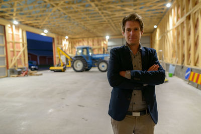 Portrait of man standing in bus