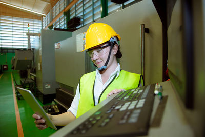 Man working on mobile phone