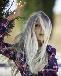 Close-up of young woman with long hair