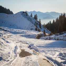 Scenic view of snow mountains against clear sky