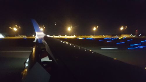 Close-up of illuminated road at night