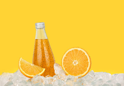 View of lemon against orange background