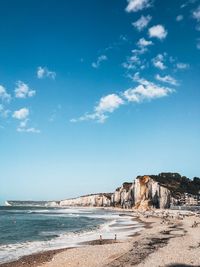 Scenic view of sea against blue sky