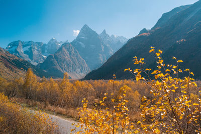 Scenic view of mountains against sky during autumn