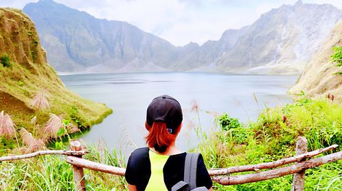 Rear view of woman looking at mountains