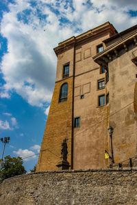 Low angle view of old building against sky