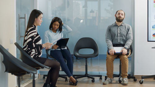 Business colleagues working in office