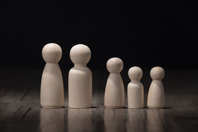 Close-up of objects on table against black background