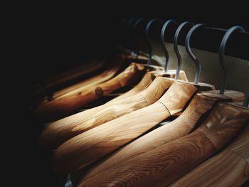 Close-up of clothes hanging on rack in store