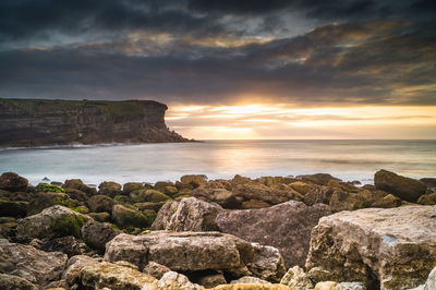 Scenic view of sea against sky during sunset