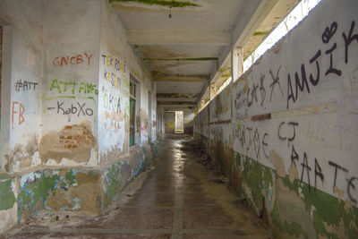 Graffiti on wall in abandoned building