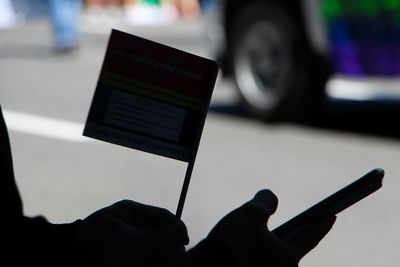 Close-up of person using mobile phone