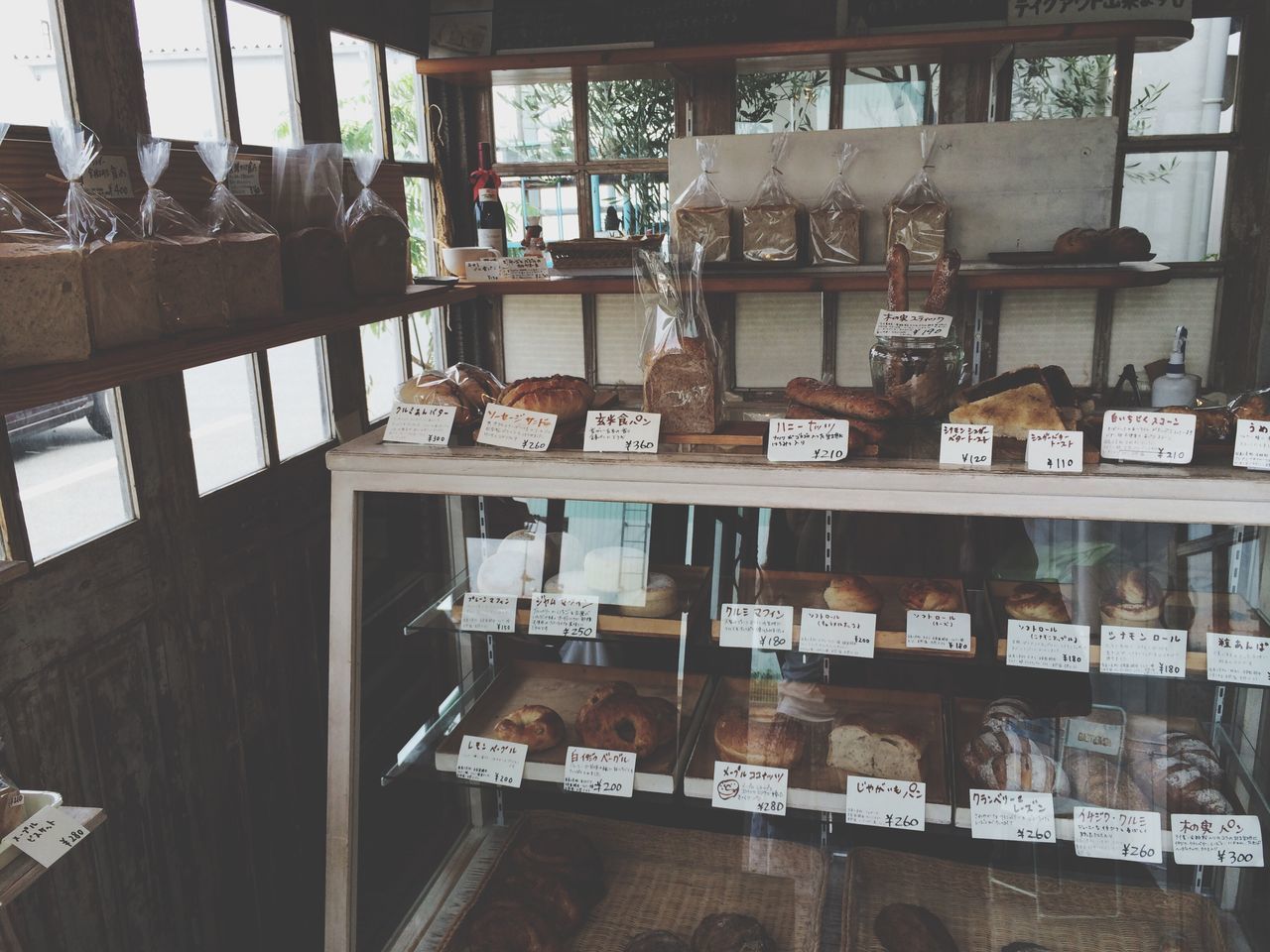 indoors, window, architecture, built structure, shelf, wood - material, in a row, arrangement, large group of objects, chair, no people, glass - material, day, order, table, balcony, old, abundance, home interior, house