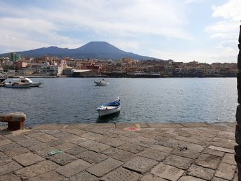 Boats moored in harbor