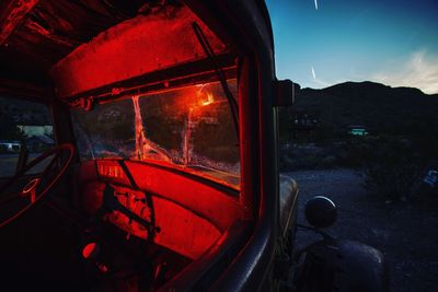 Close-up of illuminated car window at night