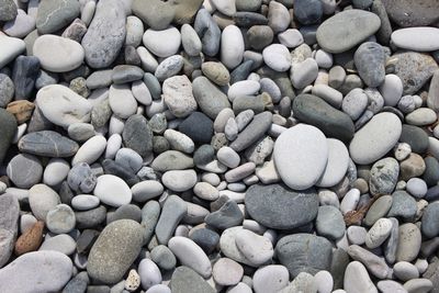 Full frame shot of pebbles at beach