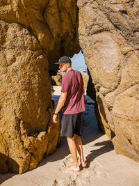 Man standing on rock