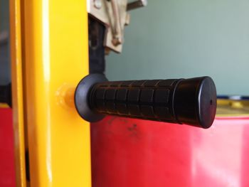 Close-up of vintage car against wall