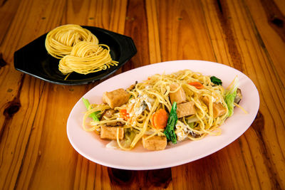 High angle view of meal served on table