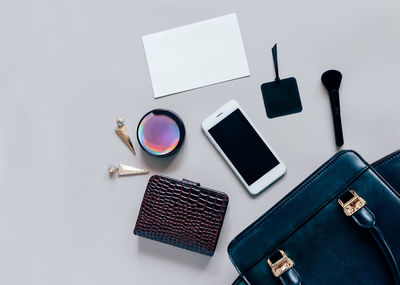 High angle view of mobile phone on table