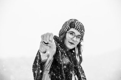 Portrait of a smiling young woman during winter