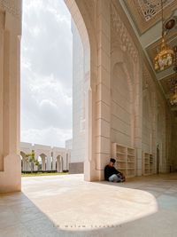 People in corridor of building