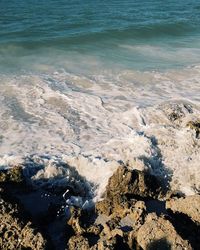 Waves splashing on rocks