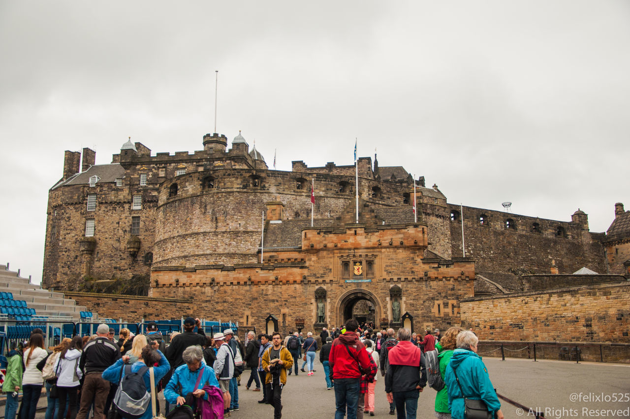 TOURISTS LOOKING AT VIEW OF BUILDING