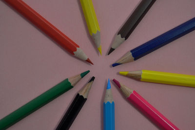 High angle view of colored pencils on table