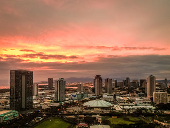 High angle view of buildings against sky during sunset
