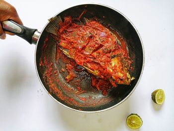 High angle view of meat in plate on table