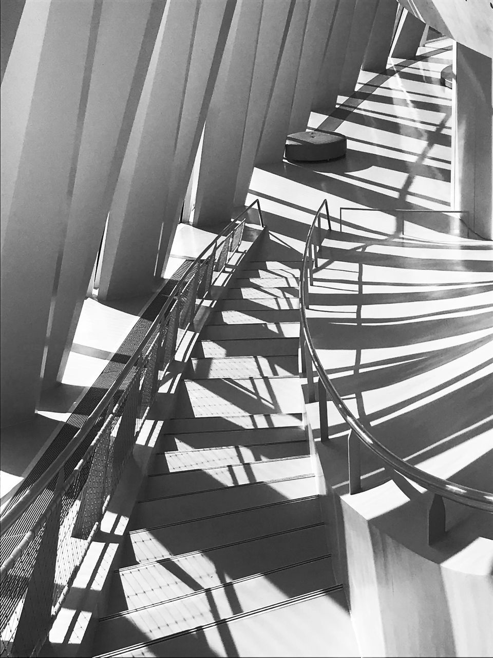 sunlight, shadow, architecture, no people, built structure, day, staircase, railing, nature, absence, steps and staircases, high angle view, wood - material, outdoors, pattern, empty, chair, seat, sunny, focus on shadow