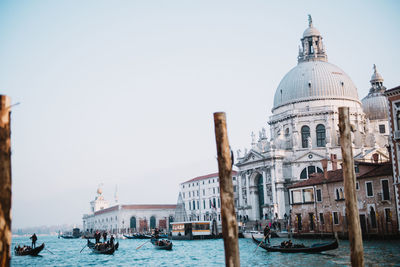 Cathedral by canal in city