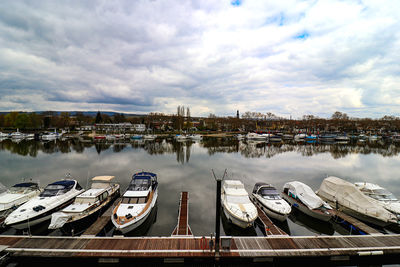 High angle view of boats moored at harbor