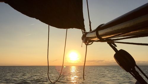 Silhouette of boat at sunset