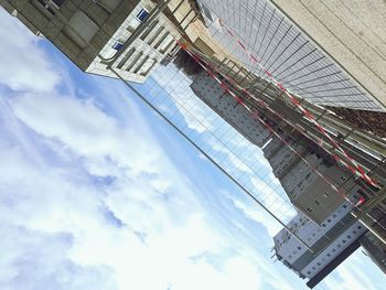 Low angle view of modern buildings against sky