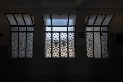 Reflection of building on glass window