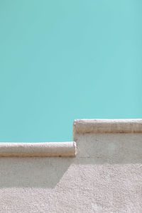 Close-up of retaining wall against clear sky