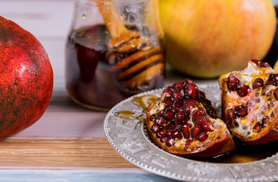 Close-up of fruits in plate on table