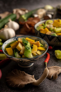 Close-up of fruits in bowl on table